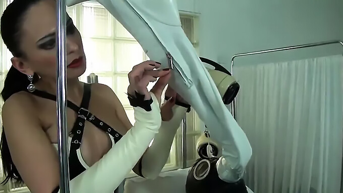 Latex-Clad Femdom In Heels Dominates Sub In Breathplay Video